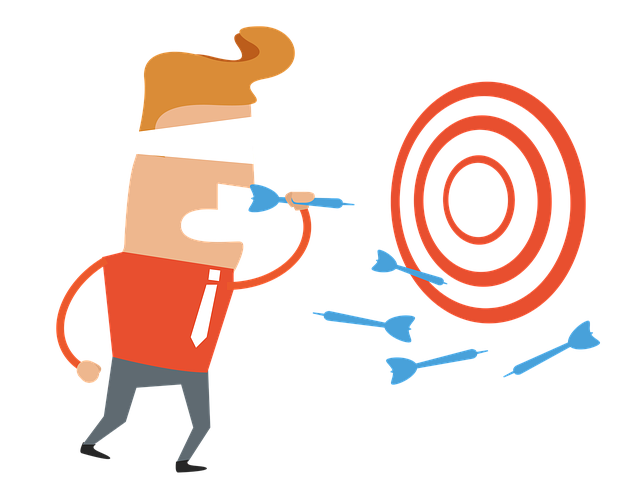 image of a person blindfolded throwing darts at a target