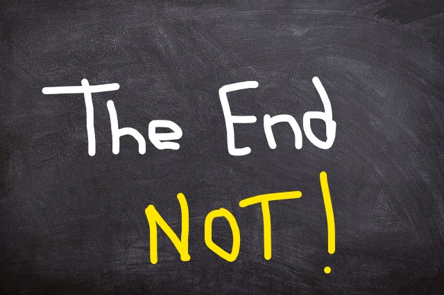 blackboard with writing - The End Not!